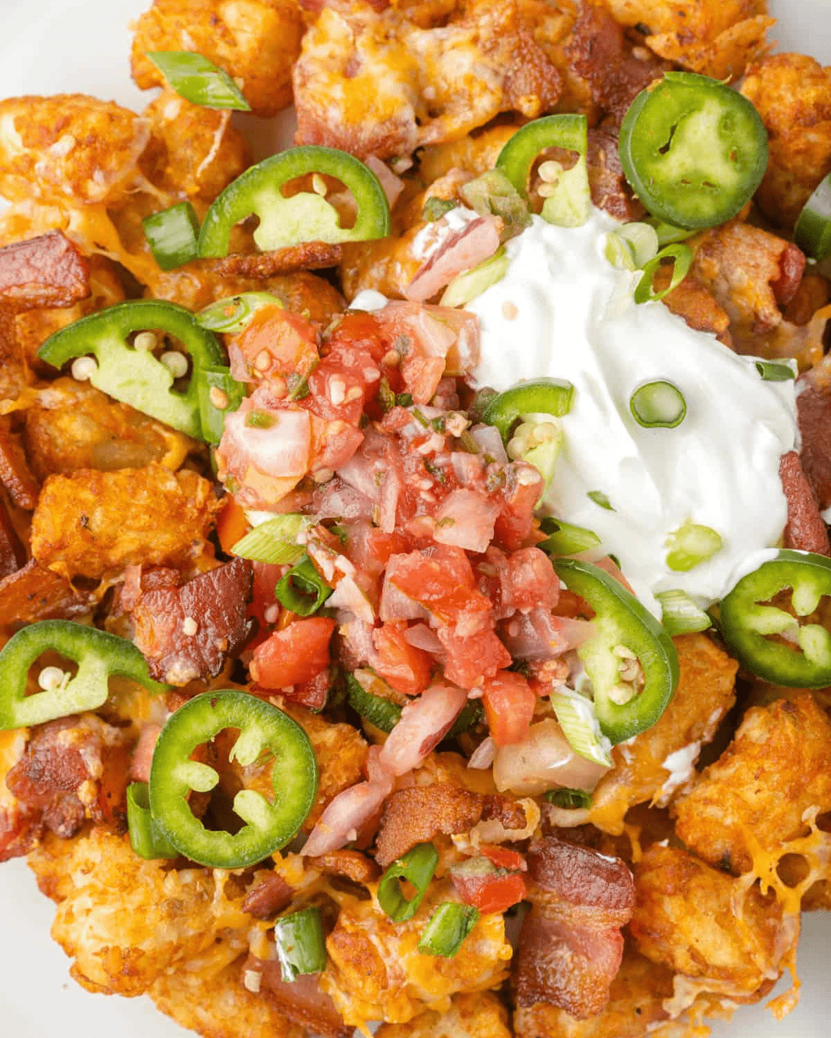 Tater tots with cheese and jalapeno peppers