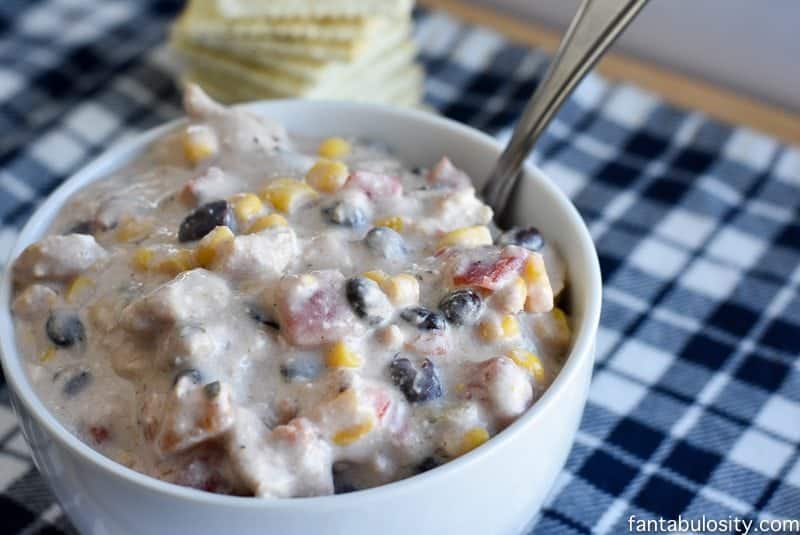 My husband BEGS me to make this creamy white chicken chili recipe all of the time. Image of soup