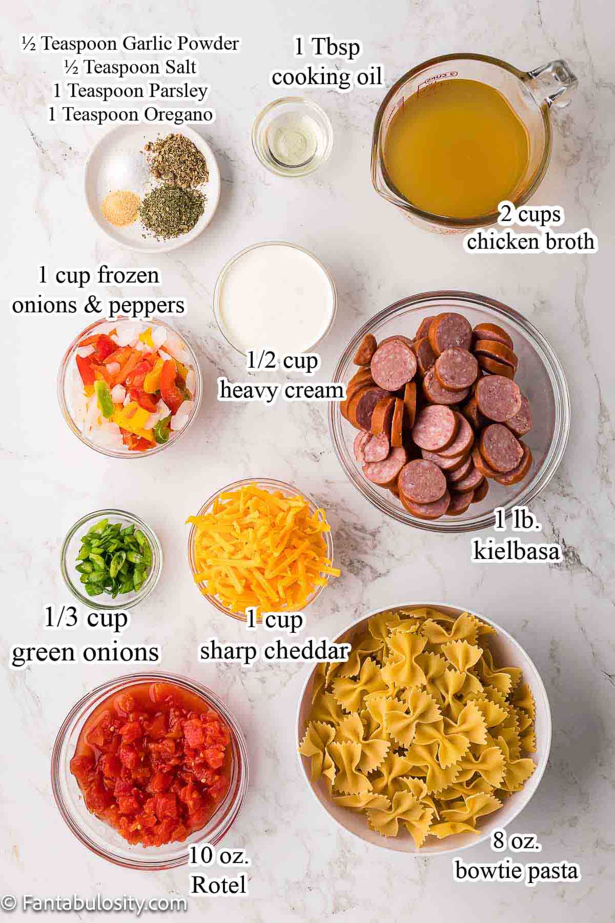 Labeled ingredients for kielbasa pasta recipe.