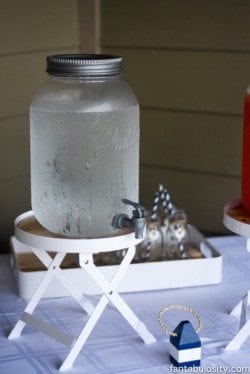 Drink Dispensers for a party, on a stand. So cute! https://fantabulosity.com