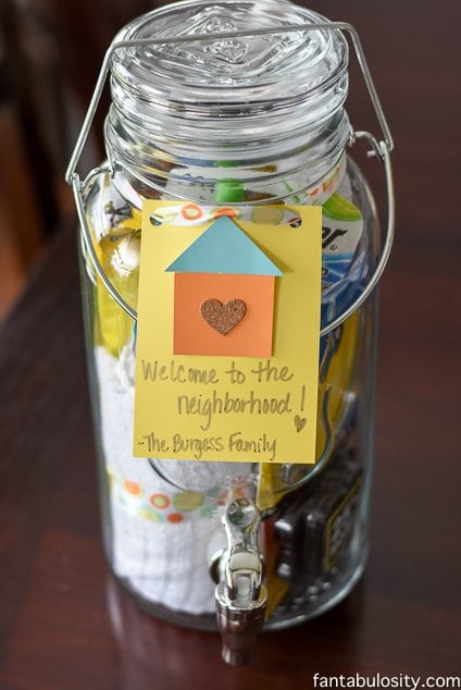 DIY Housewarming Gift Ideas. Mason Jar Drink dispenser with all of those "always need," items when moving in! Awesome! https://fantabulosity.com