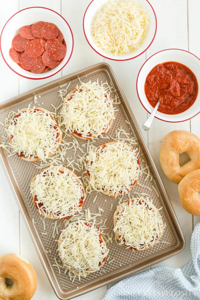 Bagel pizza ingredients - top with cheese