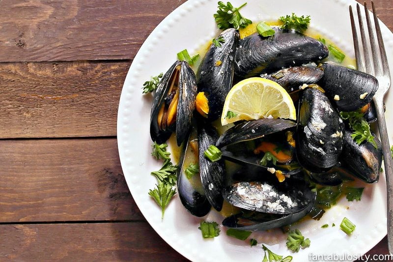An easy mussels recipe! Steamed with citrus, garlic, butter, OMG yum!