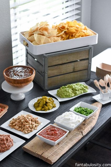 Nacho toppings on table, easily for guests to grab and go