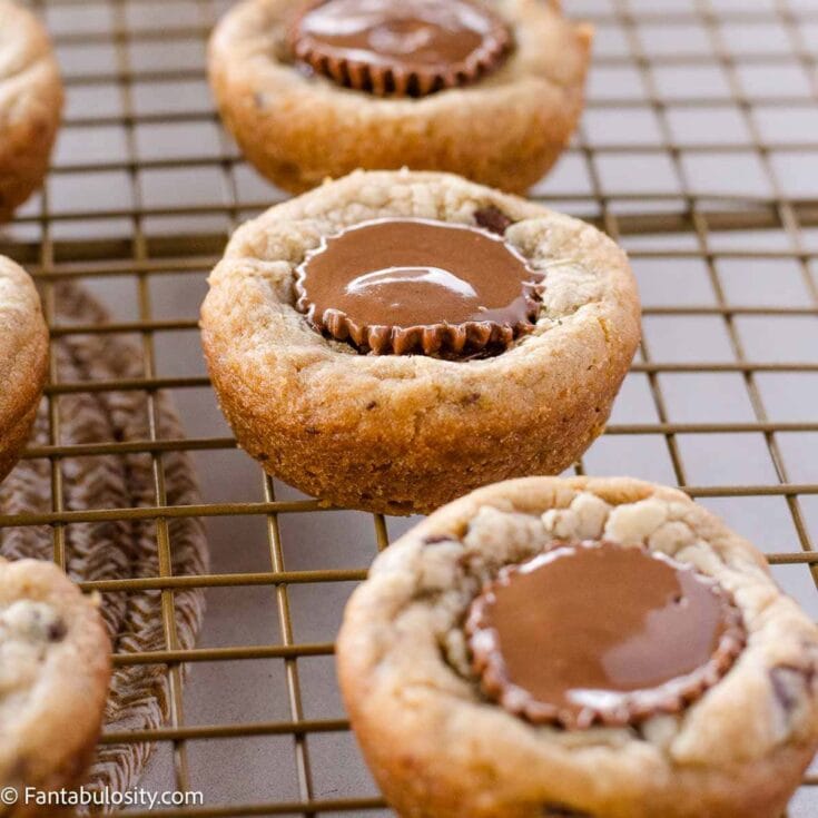 Peanut butter cup cookies on wire rack.