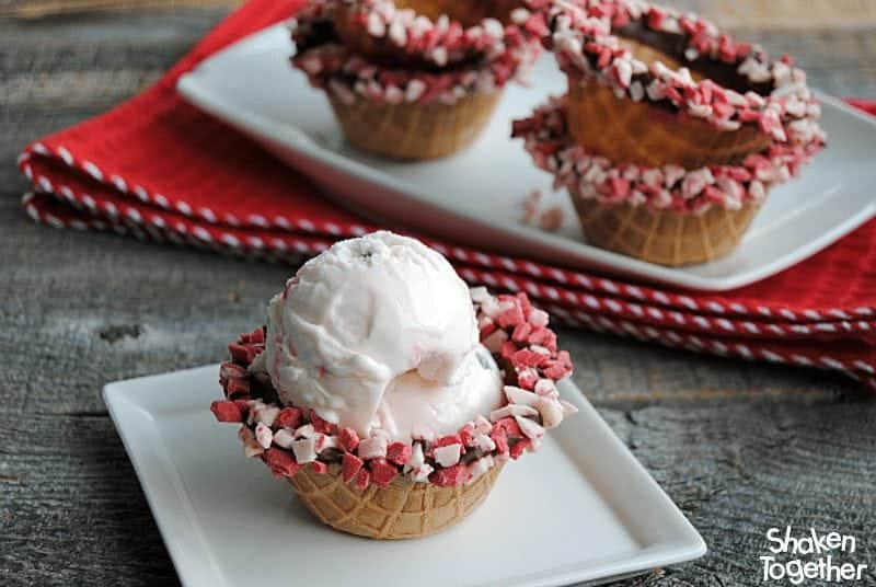 Regular waffle cone bowls are way more fun when they are dipped in chocolate and peppermint chips! What a fun way to serve ice cream, pudding or any sweet treat!