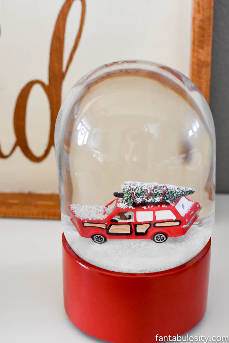 EEEK, this SNOW GLOBE! Vintage Christmas Party Ideas: Truck with Christmas Tree, cupcakes, red green and white, hot chocolate bar