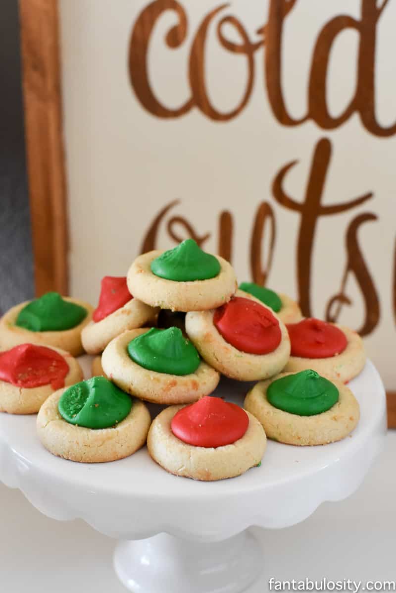 Red and green thumbprint cookies for a party! Vintage Christmas Party Ideas: Truck with Christmas Tree, cupcakes, red green and white, hot chocolate bar