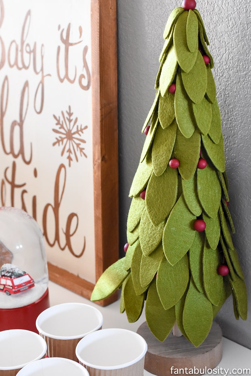 EEEK, this SNOW GLOBE! Vintage Christmas Party Ideas: Truck with Christmas Tree, cupcakes, red green and white, hot chocolate bar