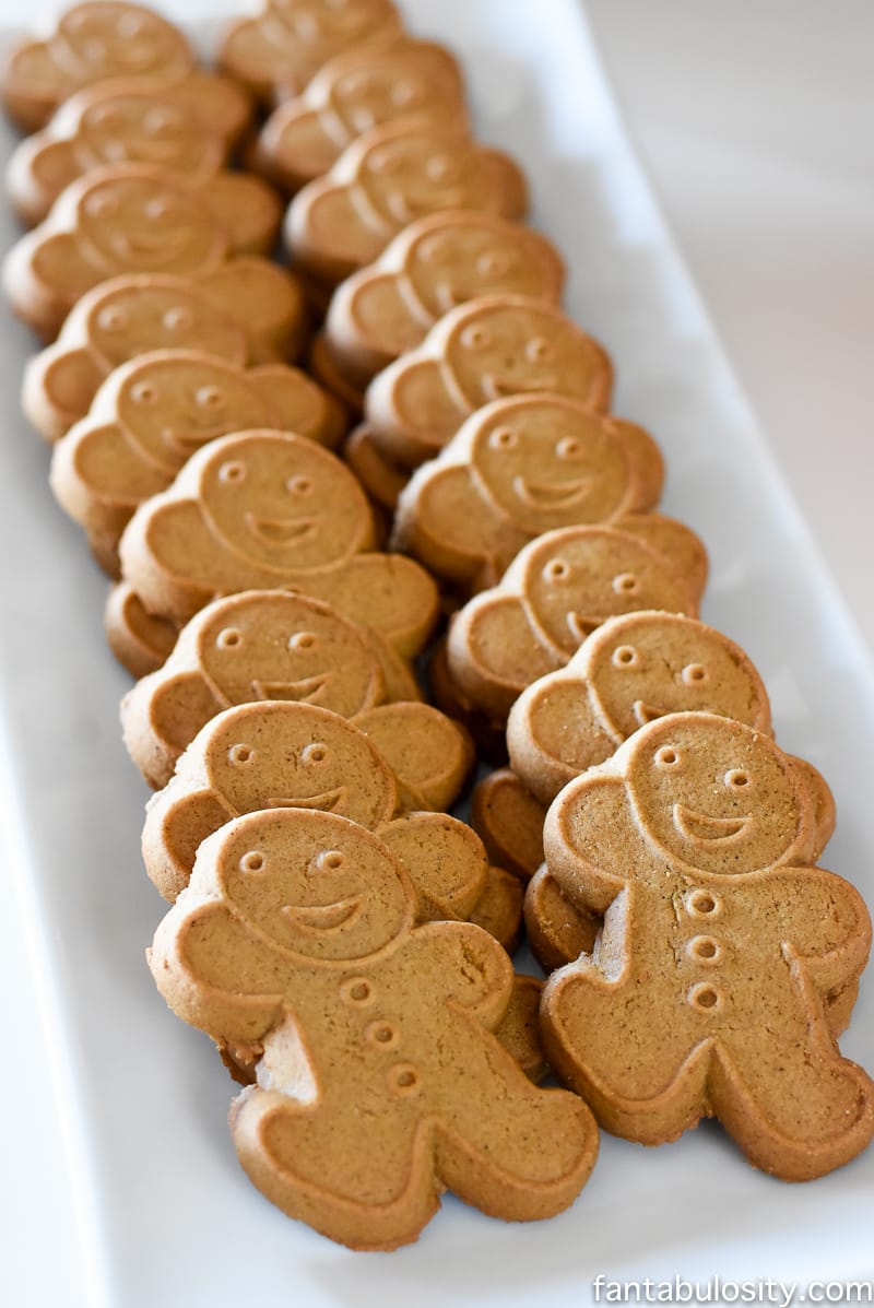 Gingerbread Men for a party! Vintage Christmas Party Ideas: Truck with Christmas Tree, cupcakes, red green and white, hot chocolate bar