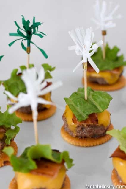 Open faced cheeseburger on Ritz crackers, appetizers! So cute & easy! Football Party Ideas fantabulosity.com