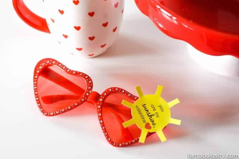 Red heart-shaped sunglasses with "You are my sunshine valentine" printable