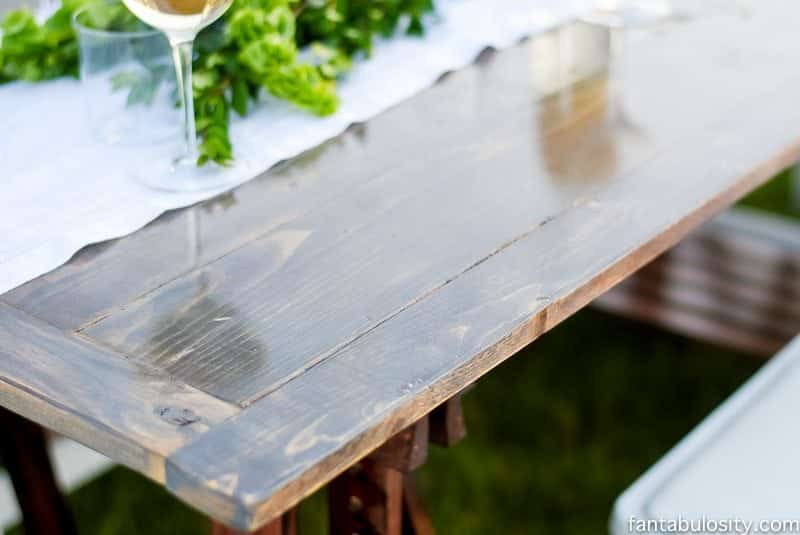 Two sawhorses from IKEA, with a table top and it's an instant pop up table! Love this. Pop Up Backyard Dinner Party: Entertaining Ideas, classy, easy simple, quick, fun, outside. Outdoor Party Ideas