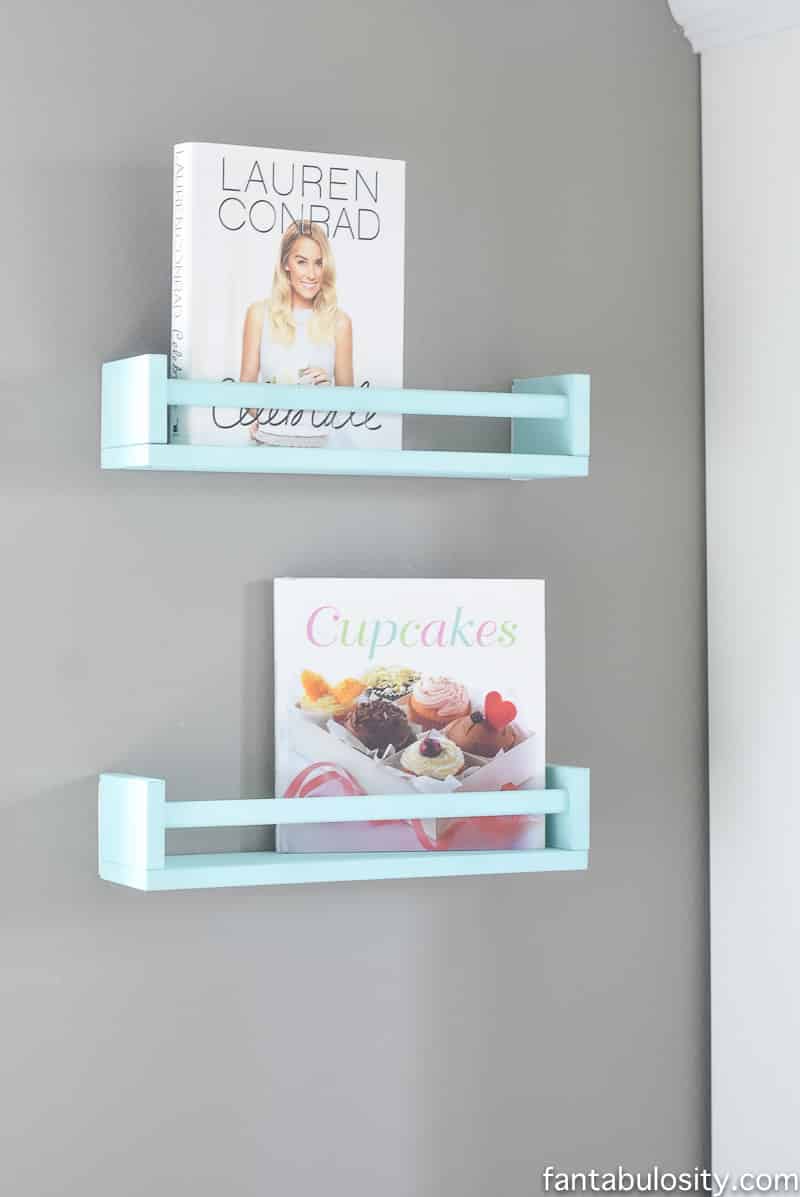 IKEA spice racks turned in to bookshelves. Ahhh! So cute. 