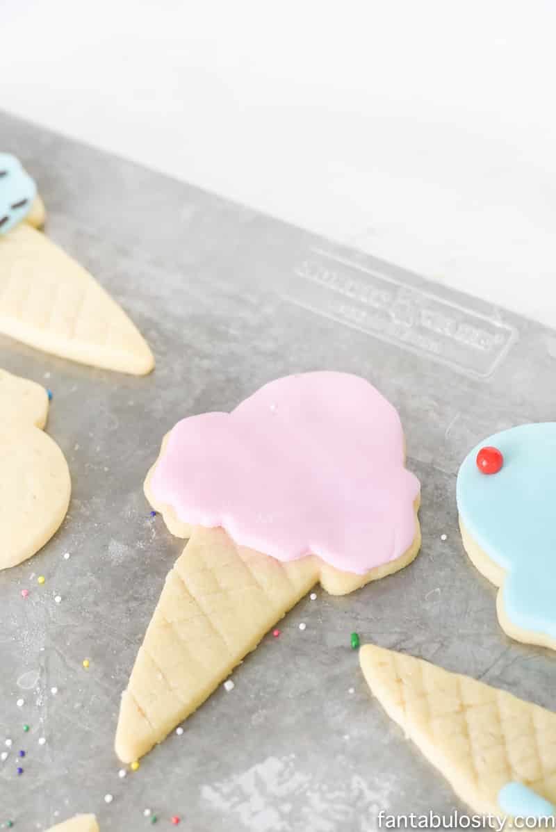 Ice cream cone sugar cookies! Using fondant instead of icing is so much easier!