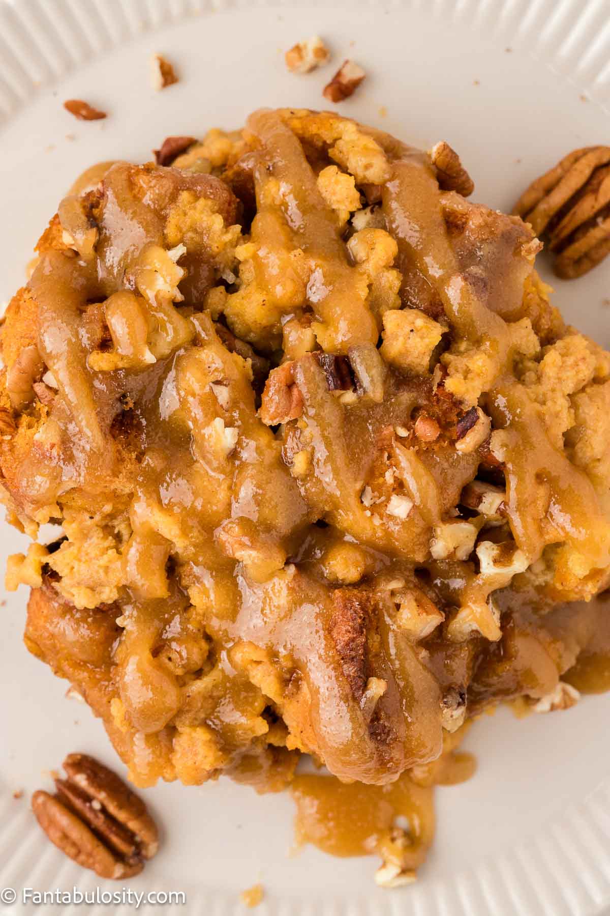A serving of sweet potato bread pudding on a plate.