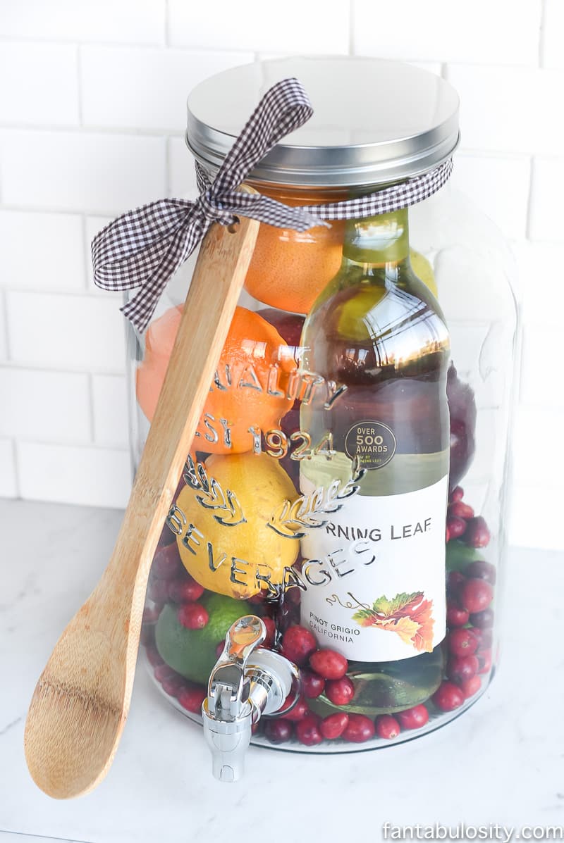 Aw, how cool is this! DIY Gift Idea: Sangria for Friends, housewarming, for women, new neighbor, anyone! Who wouldn't love this!? They can even use the drink dispenser again and again!