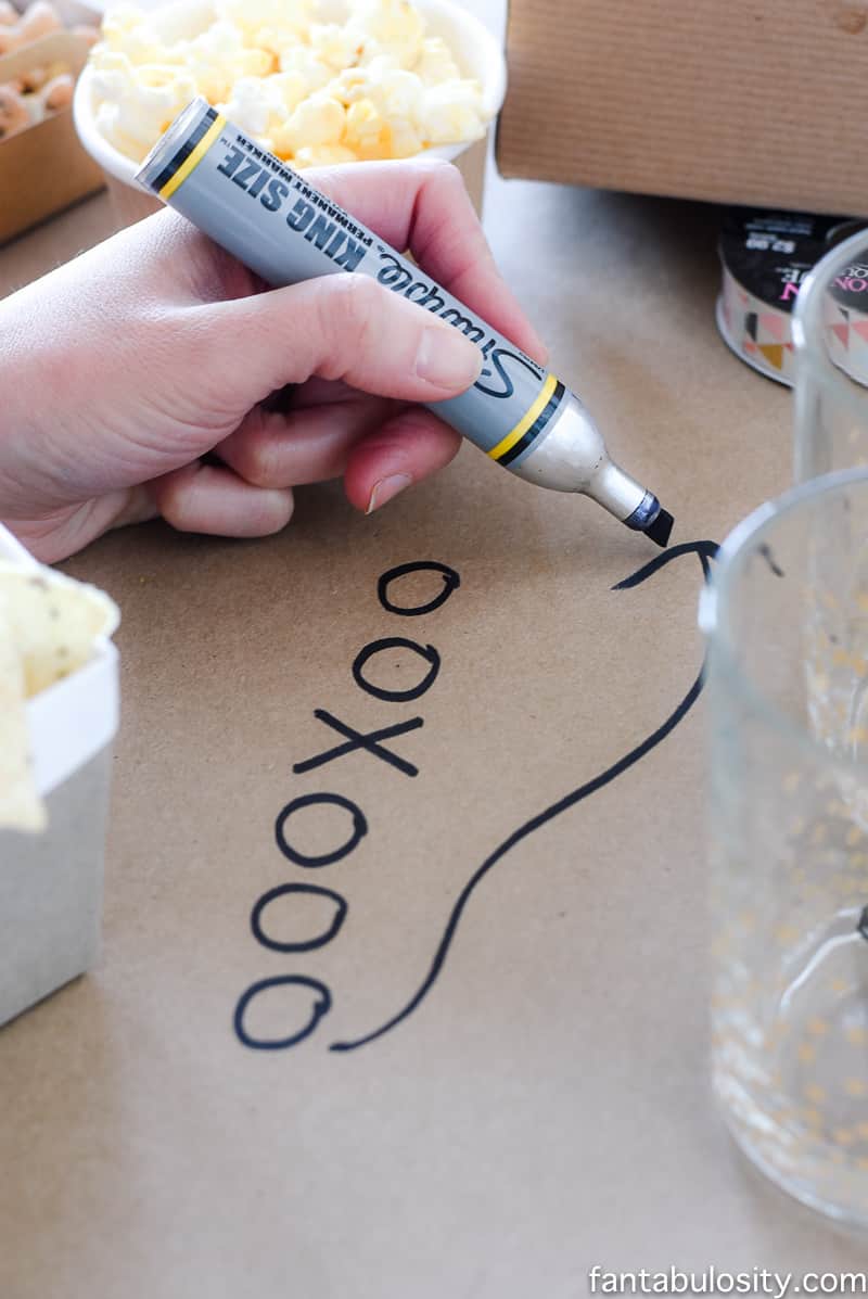 Football party ideas: Craft paper table runner with football plays drawn on. So easy.