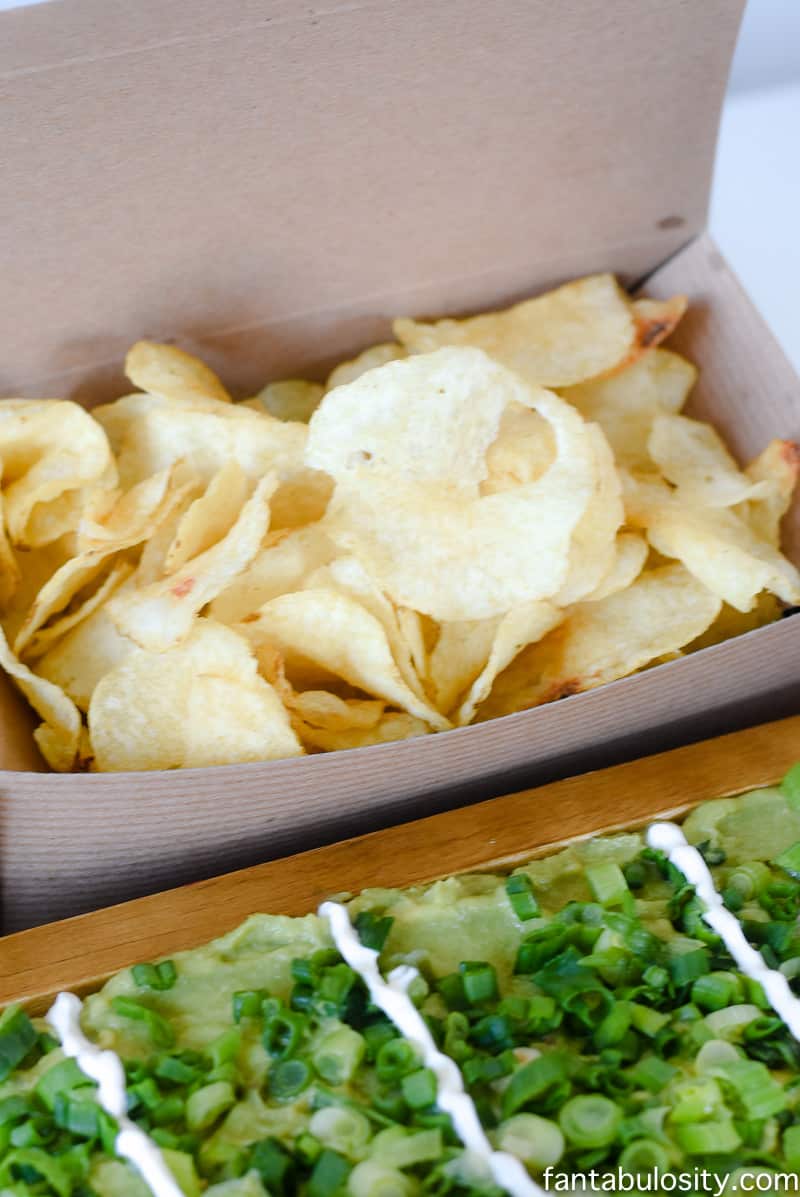 Football party food idea: football field dip with chips as the bleachers. so cute!