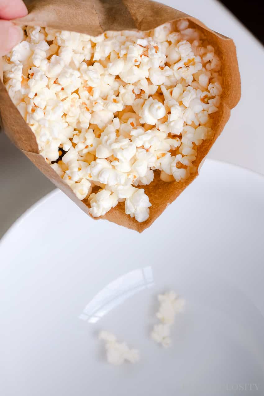 Healthy Homemade Popcorn in the Microwave in a brown bag with no oils