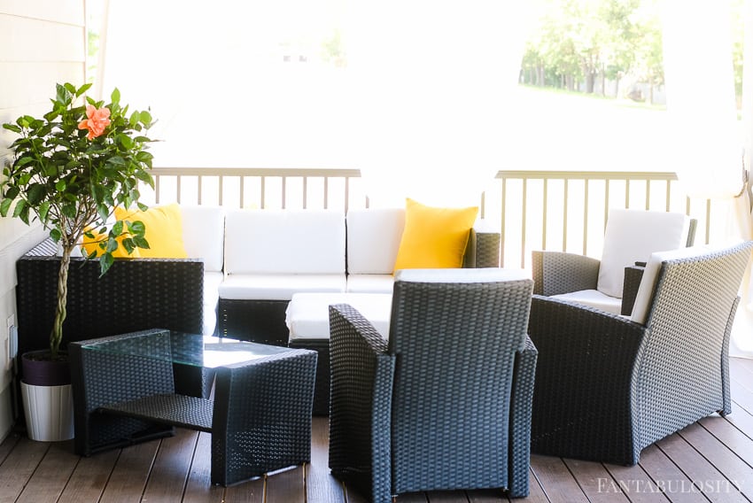 Craftsman Home Patio Back patio with white cushions, yellow pillows! Craftsman style home