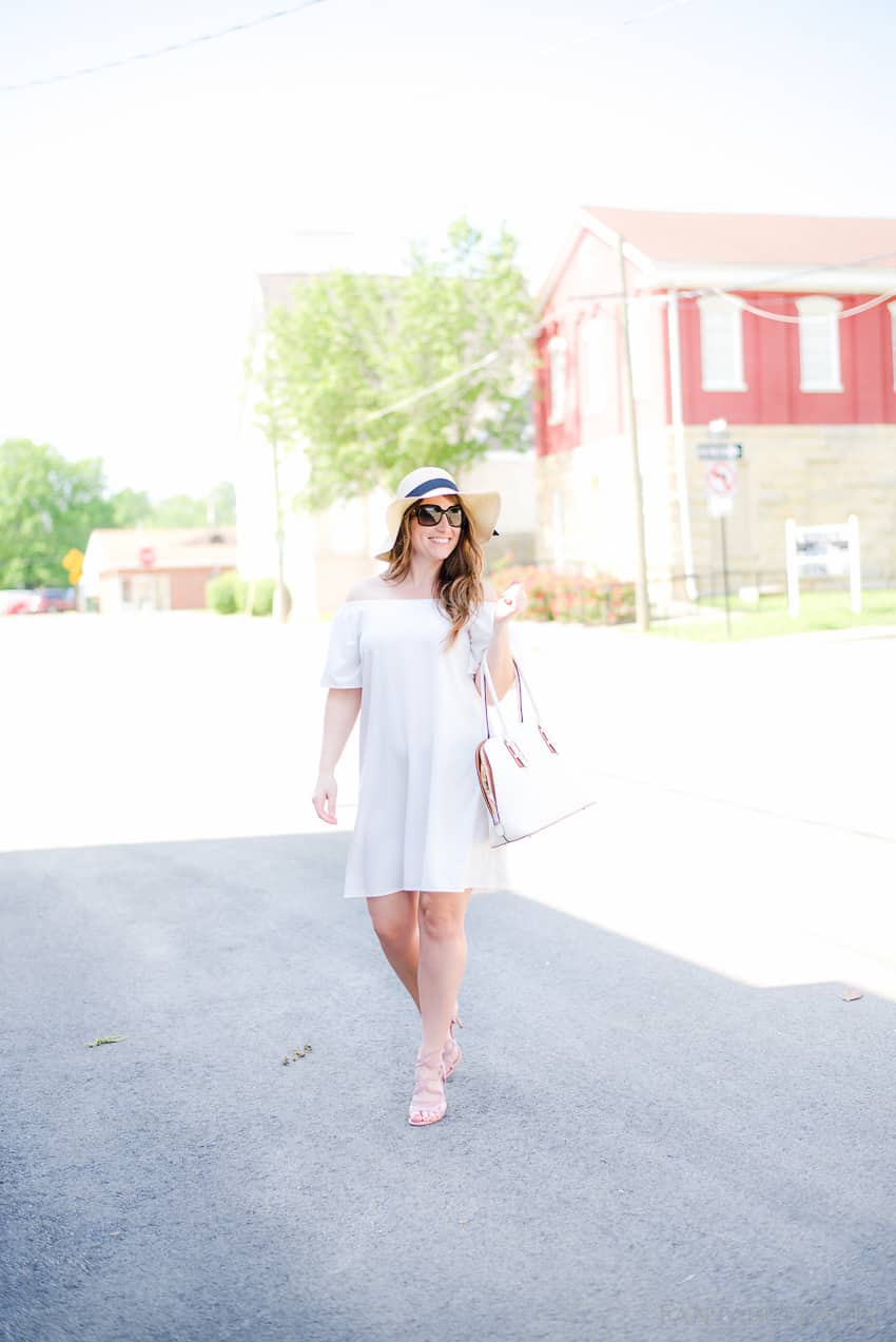 A classy look for the season. White off the shoulder shift dress; perfect for spring and summer day or night!