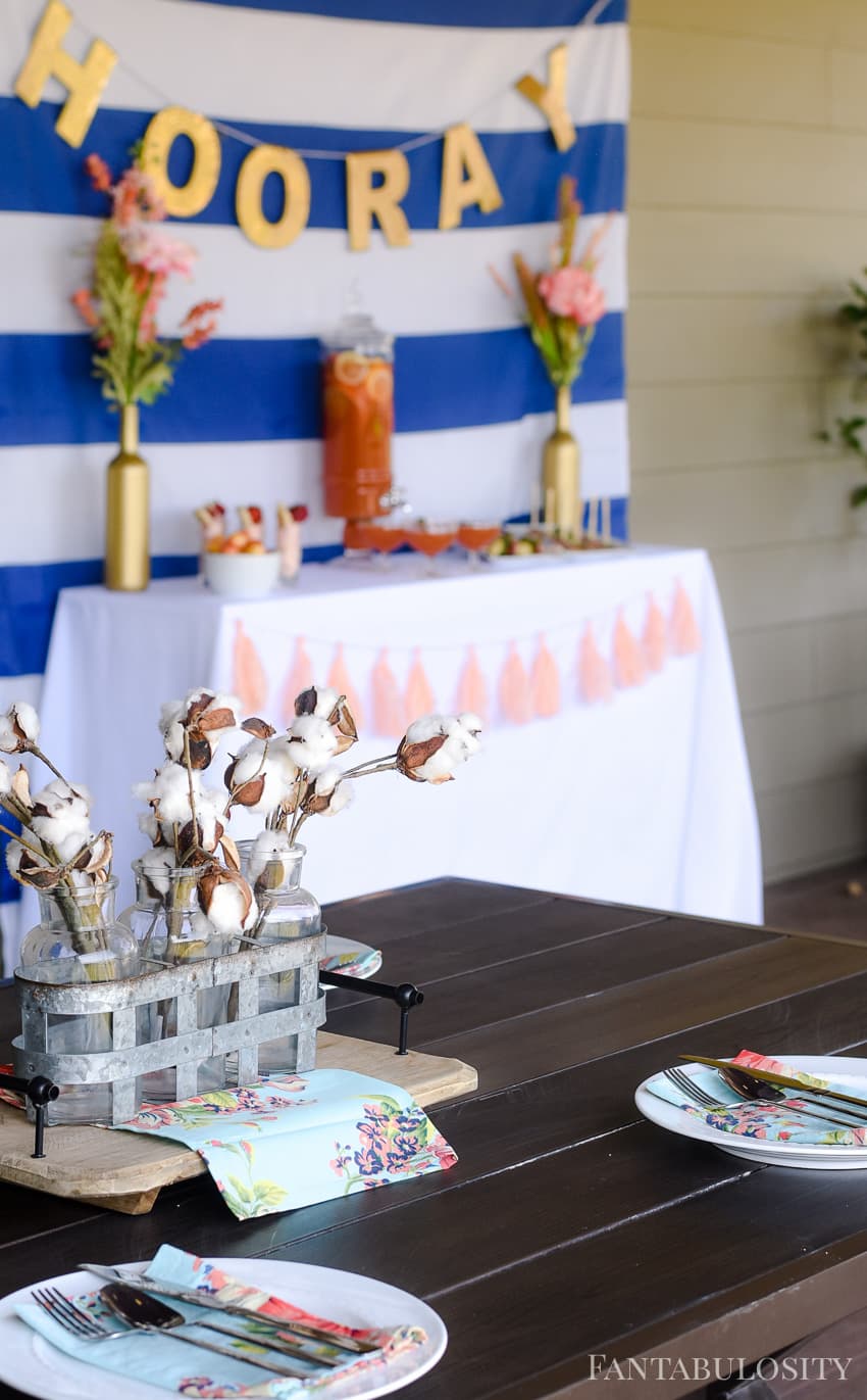 Summer soiree party on a patio. Love how the food is served on a buffet outside, and the guests can still have the table available! 