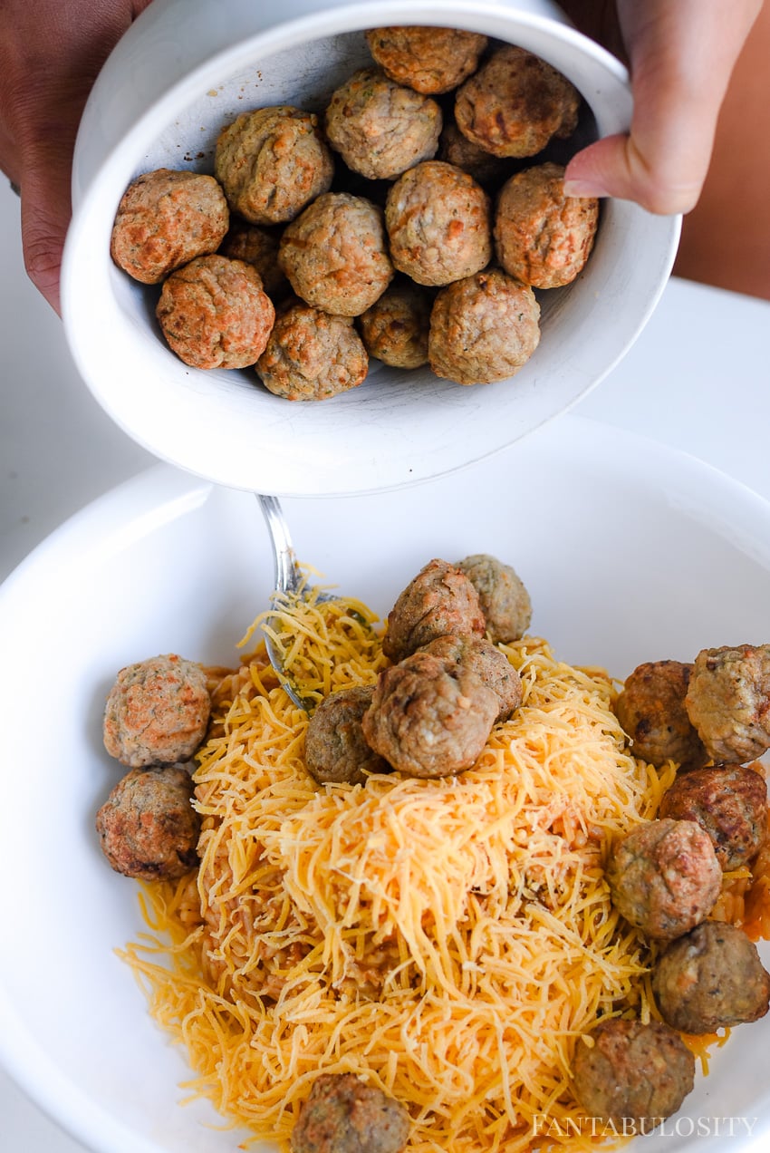 Beef meatballs mixed with rice and cheese for a stuffed bell peppers recipe