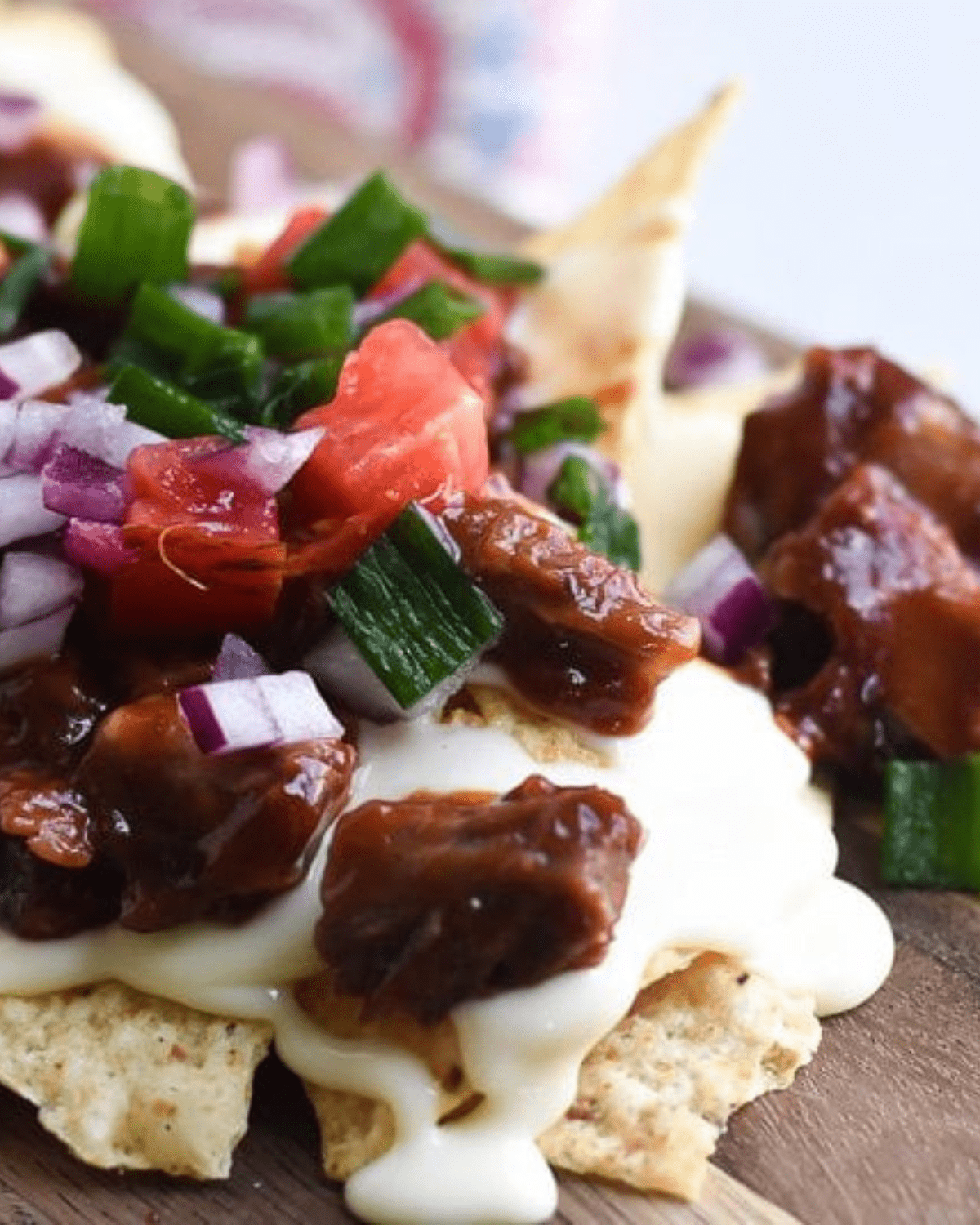 BBQ Meat over queso chips