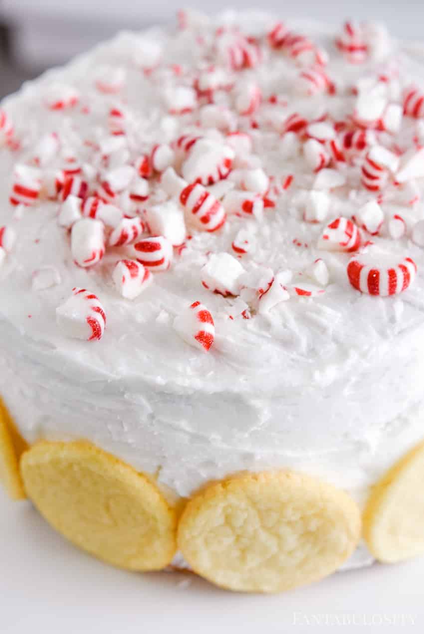Top the cake with crushed peppermint candies