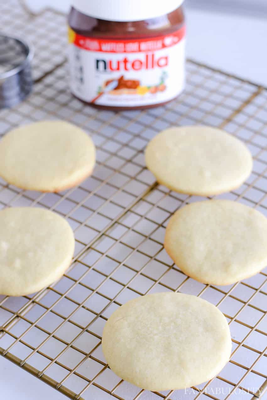 Round sugar cookies with nutella topping