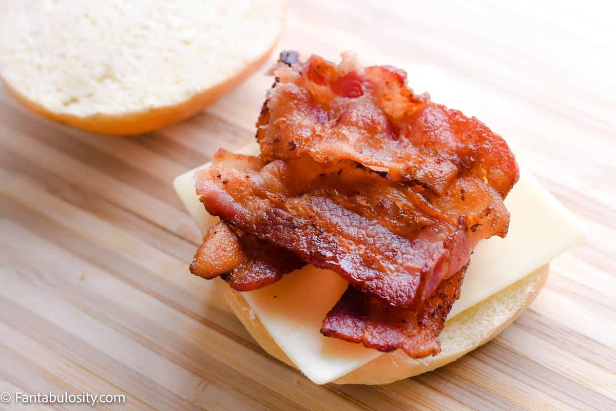 Cheese and bacon on bun