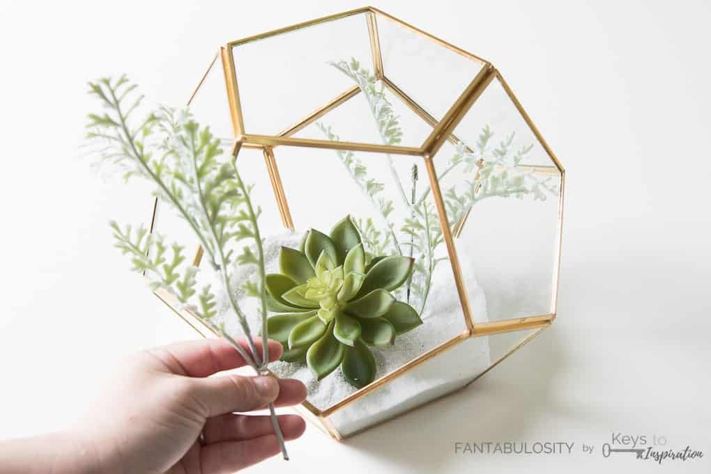 Create this easy DIY floral terrarium using only a few supplies. This tutorial will show you how to make a beautiful terrarium for your home!
