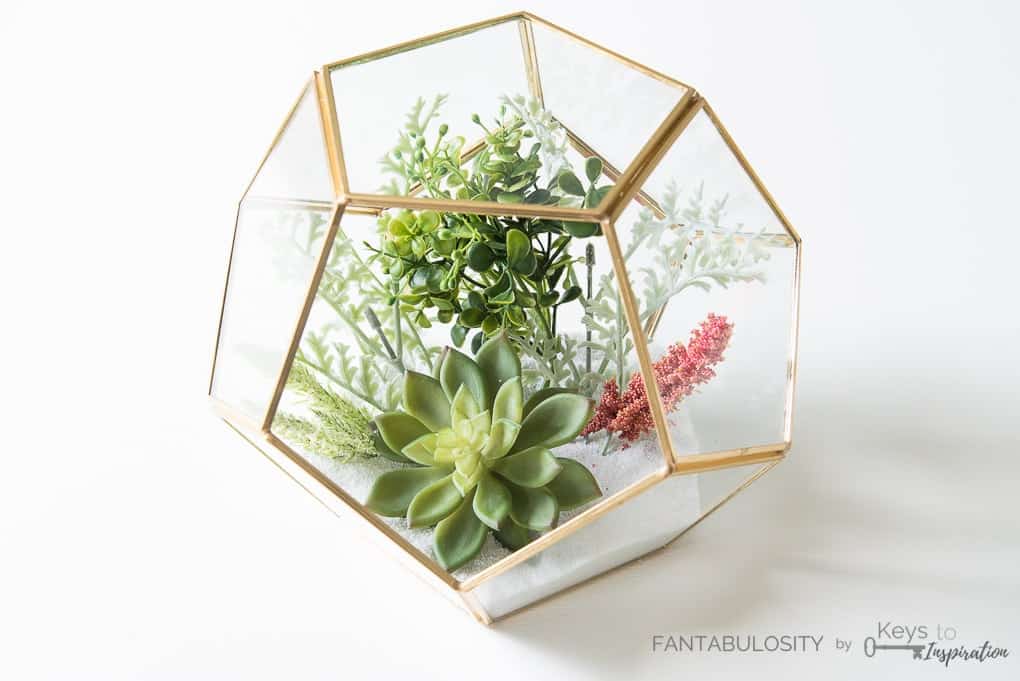 Create this easy DIY floral terrarium using only a few supplies. This tutorial will show you how to make a beautiful terrarium for your home!