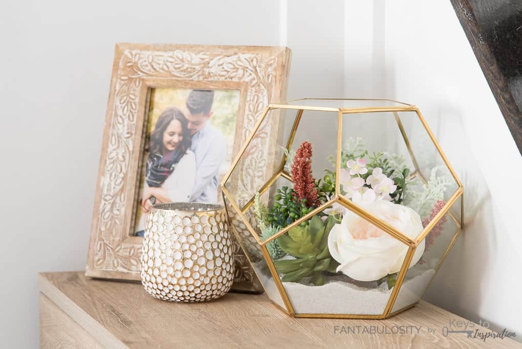 Create this easy DIY floral terrarium using only a few supplies. This tutorial will show you how to make a beautiful terrarium for your home!