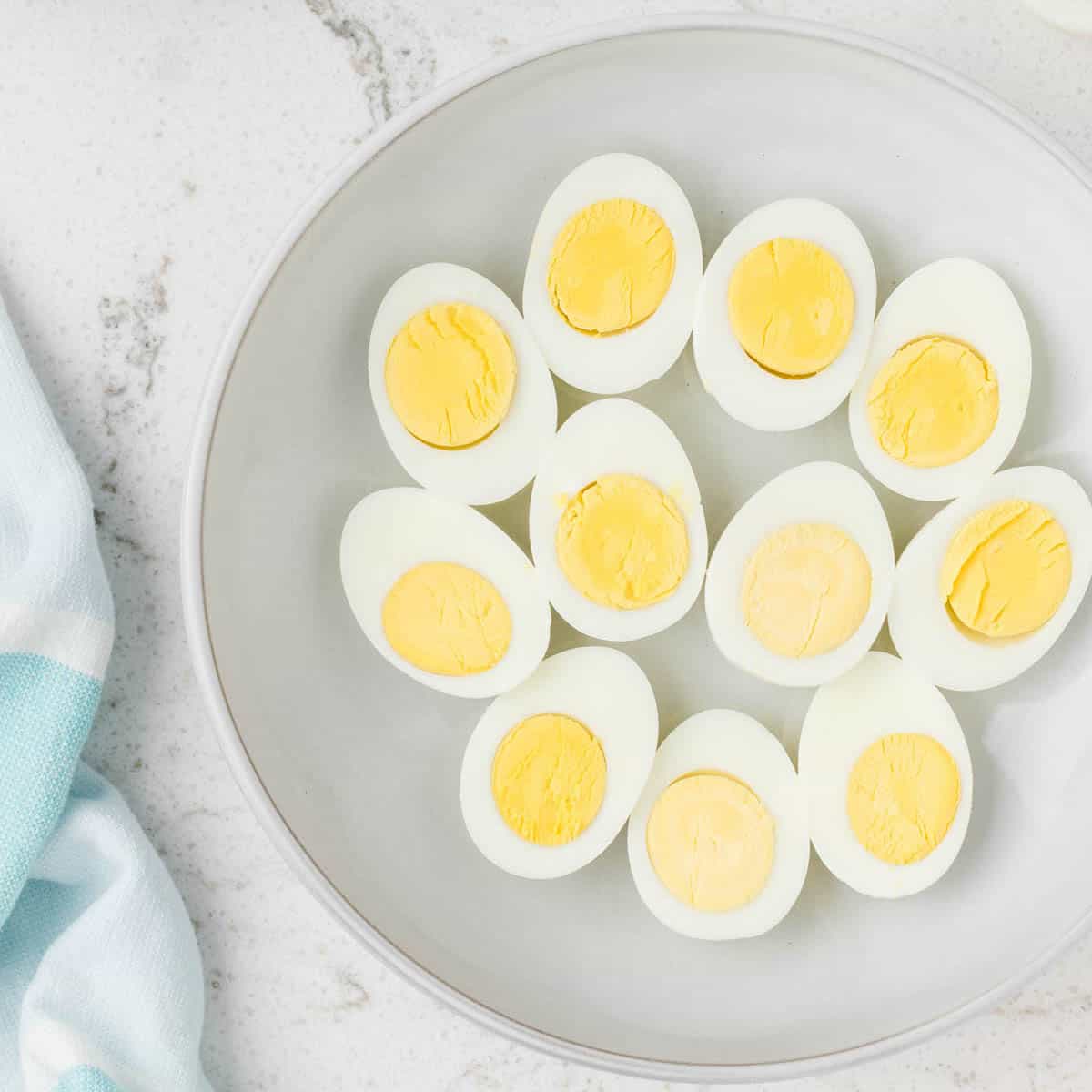 sliced hard boiled eggs on plate