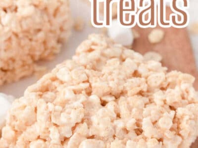 A rice krispie treat on cutting board with text on image.