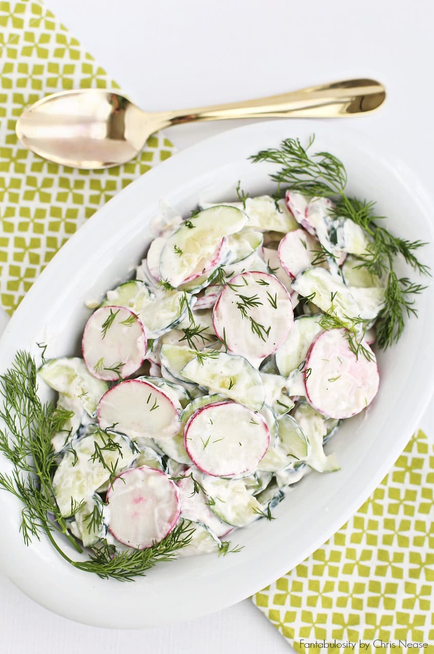 This creamy crunchy cucumber salad is a delicious side dish for potluck parties.