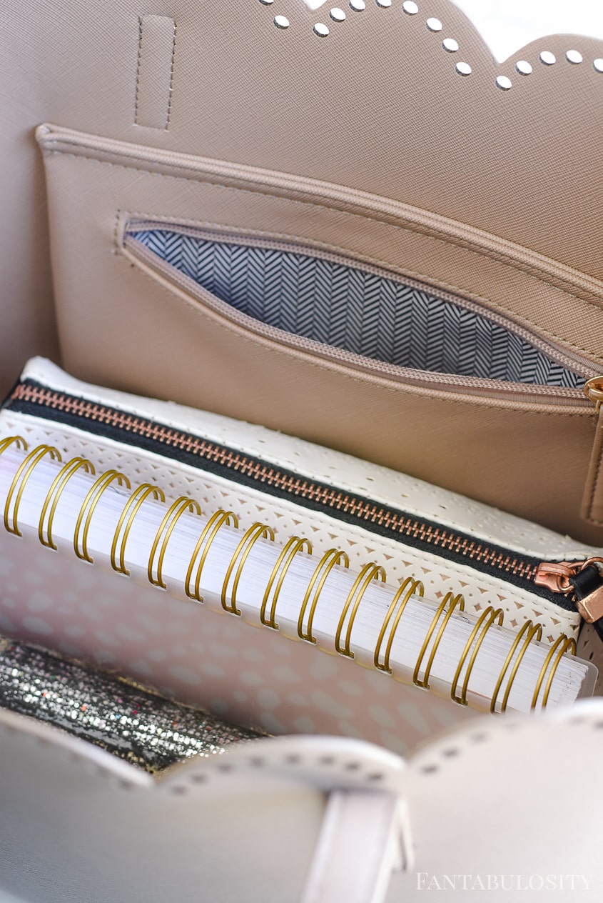 If there's room, and when I'm working, I keep my planner and laptop in my purse too.