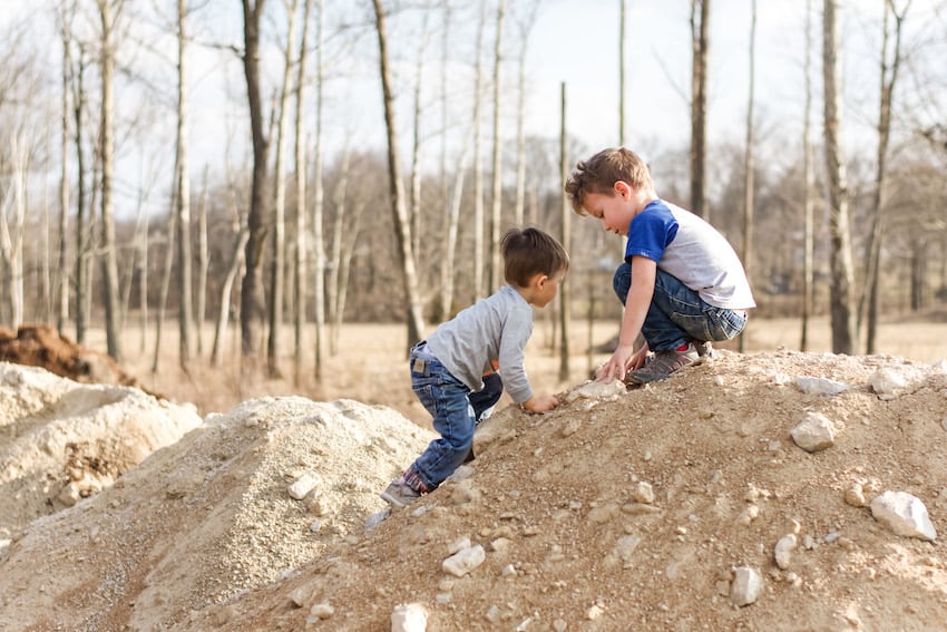 Boys playing in the dirt