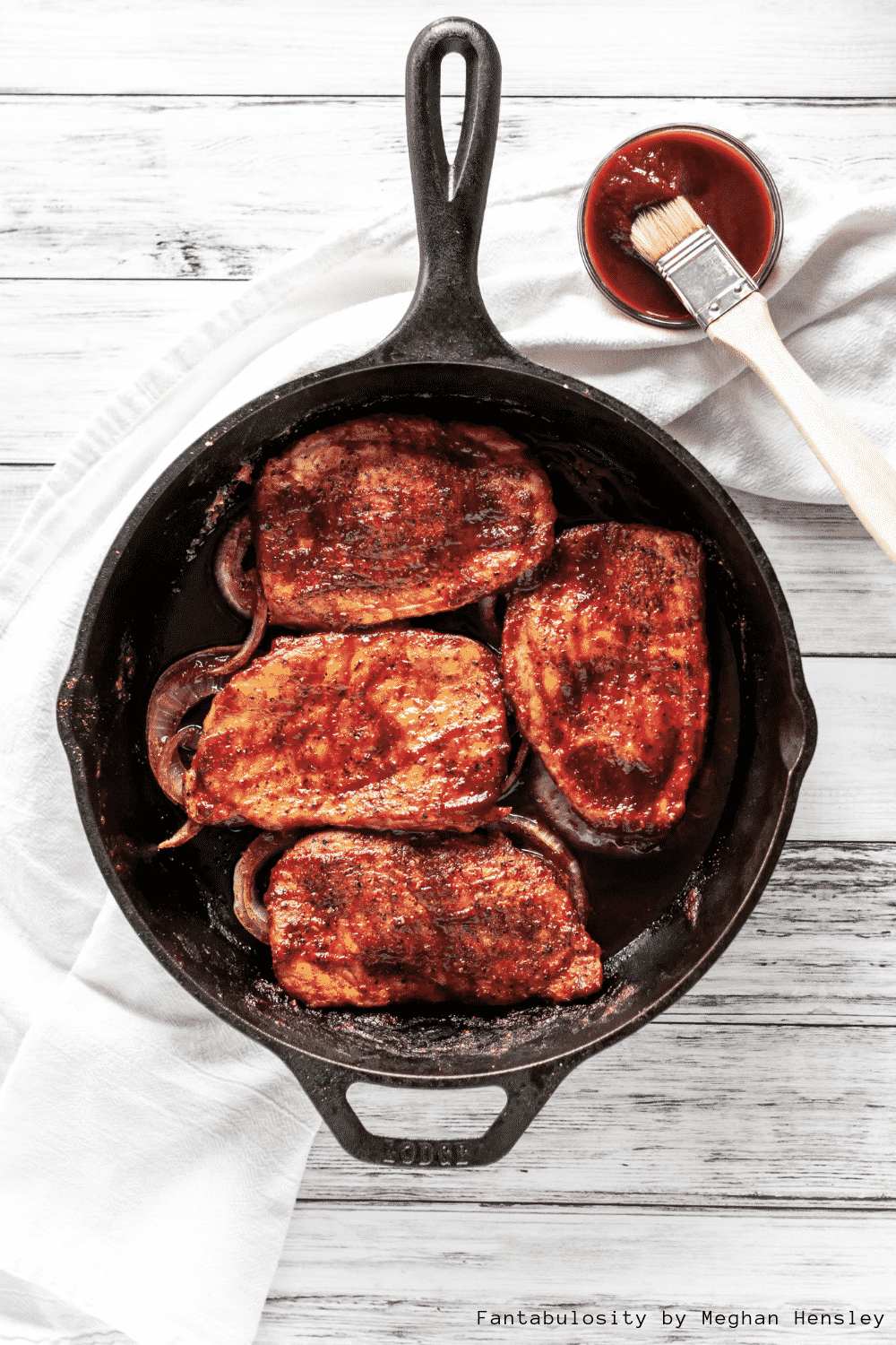 BBQ Baked Pork Chops are a super easy weeknight meal that's on the table in 30 minutes. Sweet, smoky, simple and delicious.