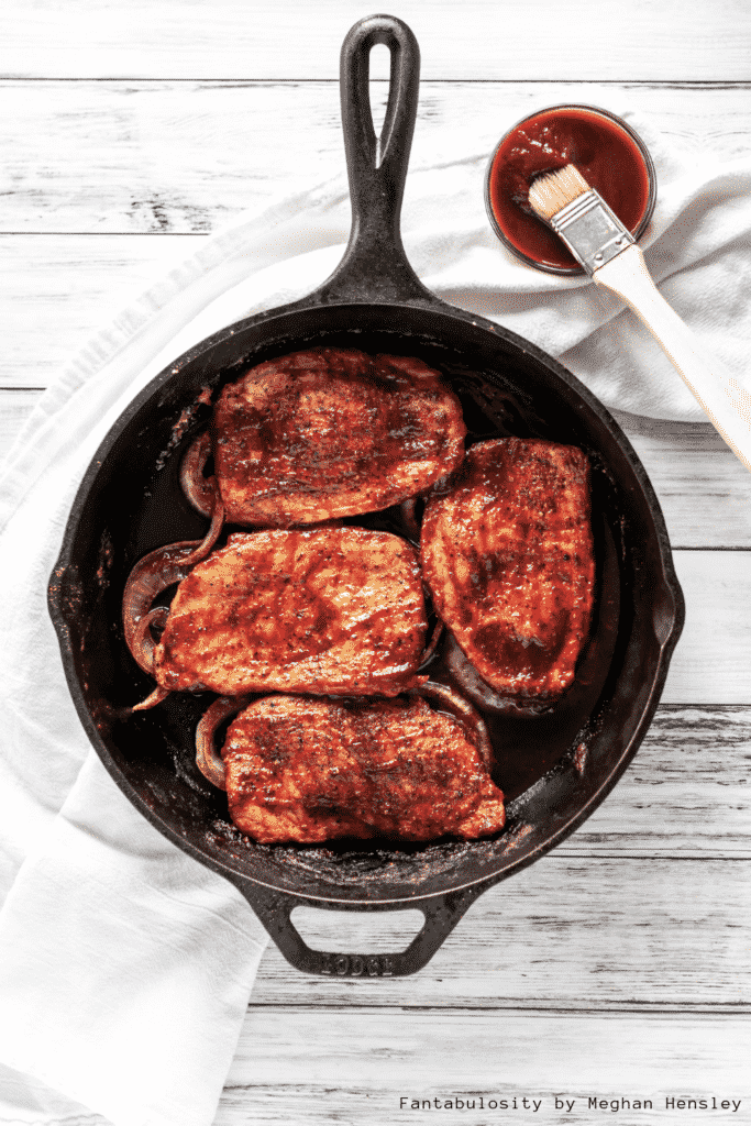 BBQ Baked Boneless Pork Chops are a super easy weeknight meal that's on the table in 30 minutes. Sweet, smoky, simple and delicious.