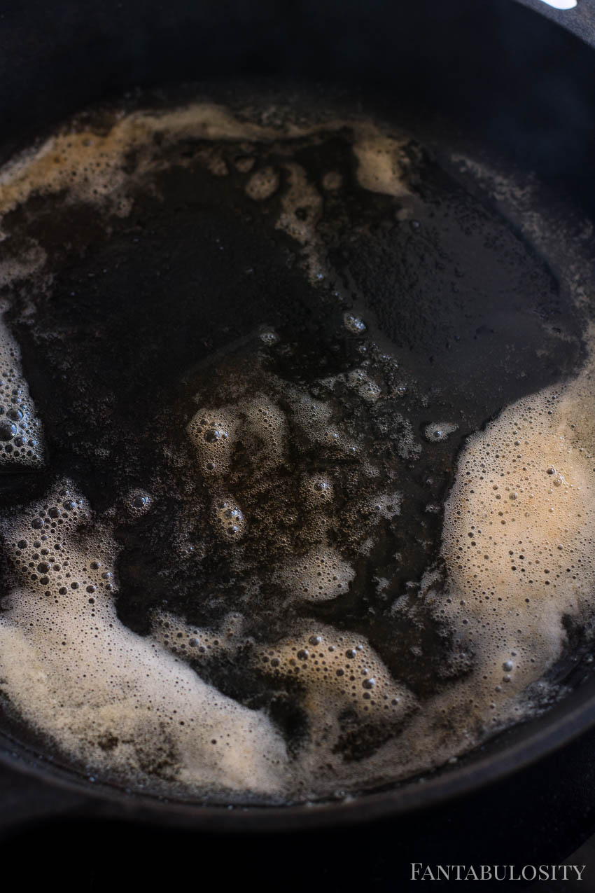 Melted browned butter in cast iron skillet for steak bites