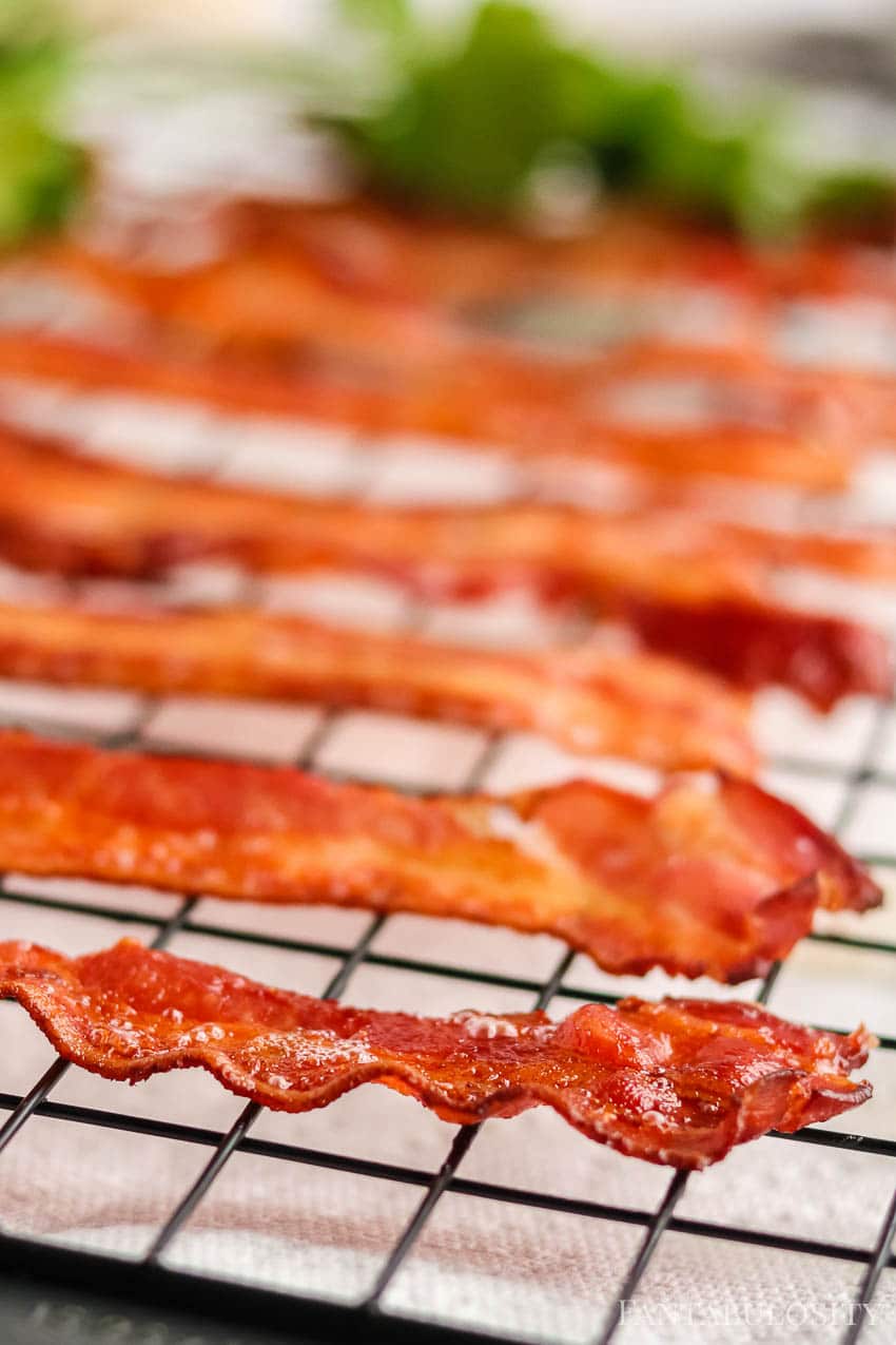 Cook bacon in the oven and cool off to chop