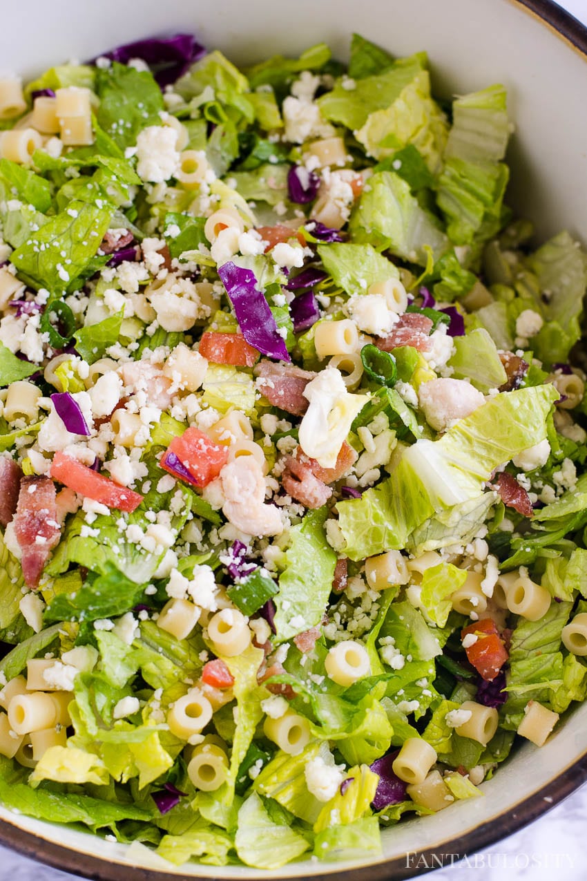 Mix together ingredients for Italian Chopped Salad