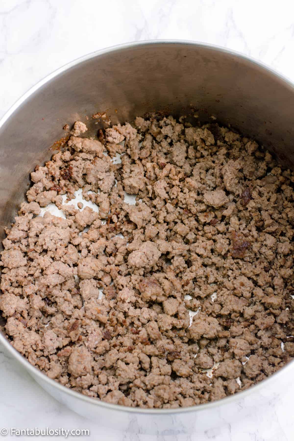 Cooked ground beef in pot