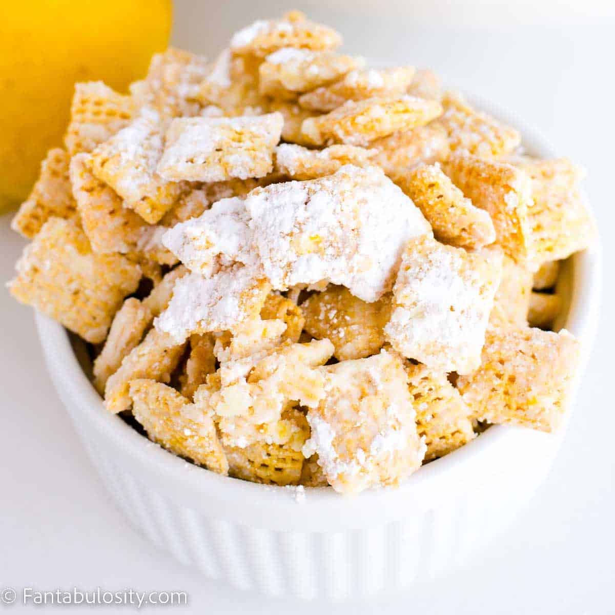 Lemon Puppy Chow in white bowl.