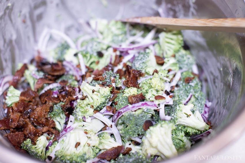 Add in the bacon to the broccoli raisin salad