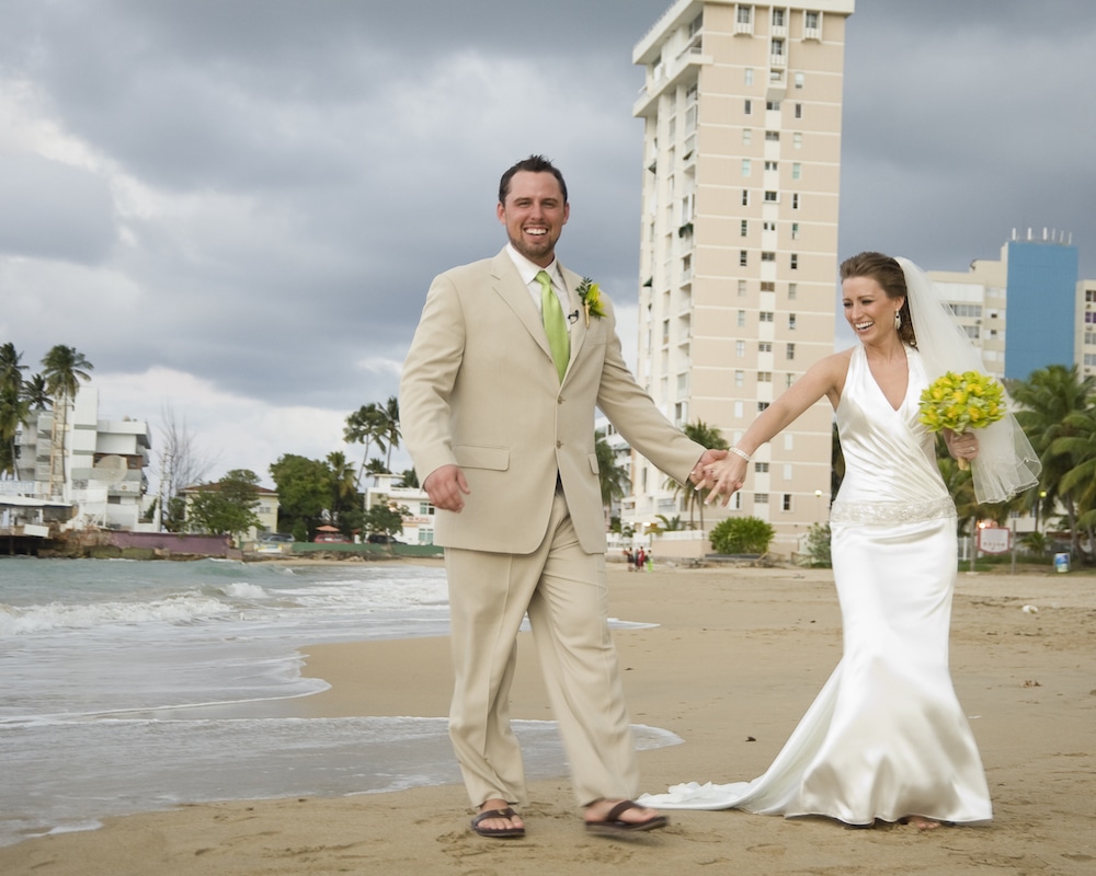 Husband and wife married on the beach