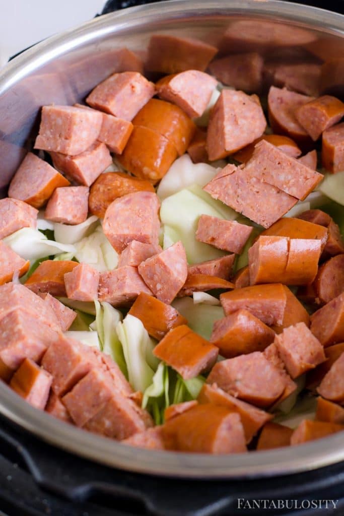 Chopped kielbasa and cabbage in the Instant pot to cook